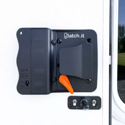 Close-up view of a latch.it rv keyless door lock installed