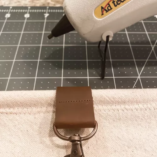 Hot gluing the fabric inside the curtain panel
